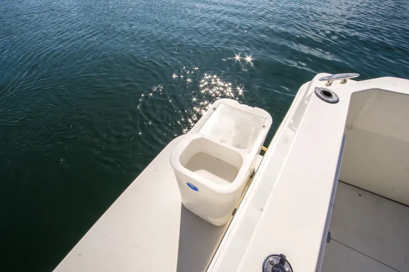 Slide: The Image of 2006 Carver 33 Super Sport boat deck with water reflections. - 16