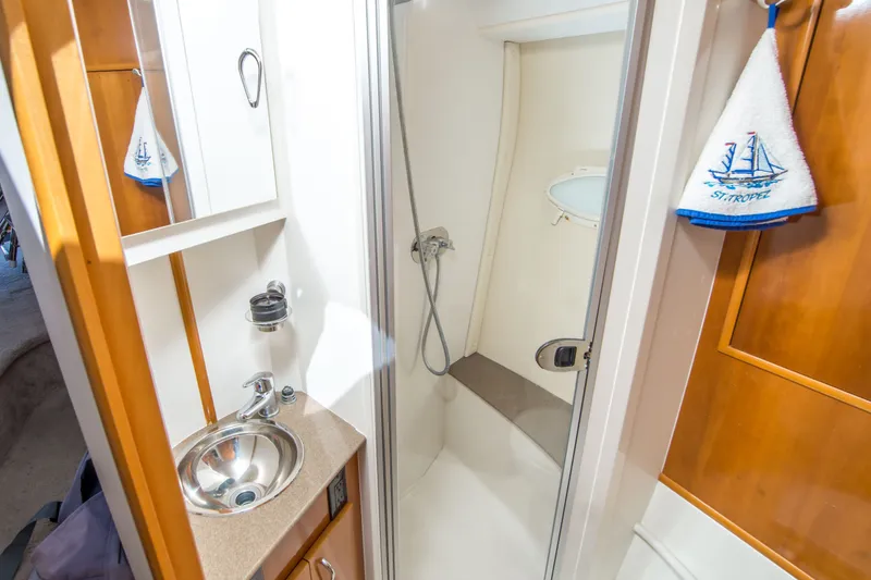Slide: The Image of Bathroom interior of 2006 Carver 33 Super Sport yacht with shower and sink. - 29