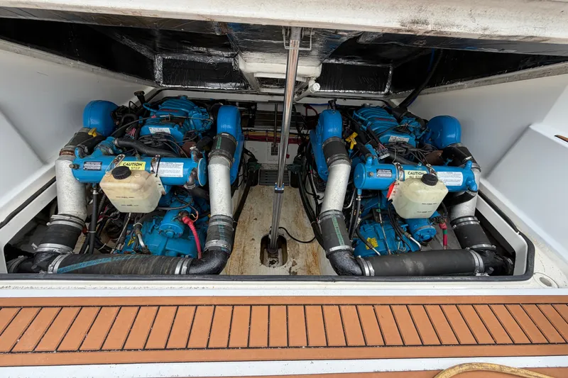 Slide: The Image of Engine compartment of a 2001 Tiara Yachts 2900 Coronet with twin blue engines. - 18