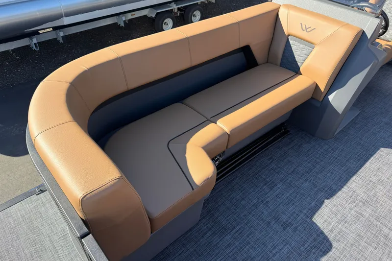 Slide: The Image of Luxurious seating on 2027 Whisper Drift RLS boat, featuring tan upholstery and modern design. - 12