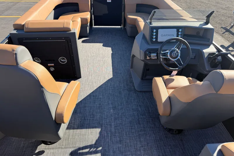 Slide: The Image of Luxurious interior of 2027 Whisper Drift RLS boat with tan seating and modern dashboard. - 17