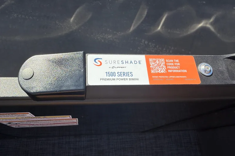 Slide: The Image of SureShade 1500 Series Premium Power Bimini with QR code for product information. - 14