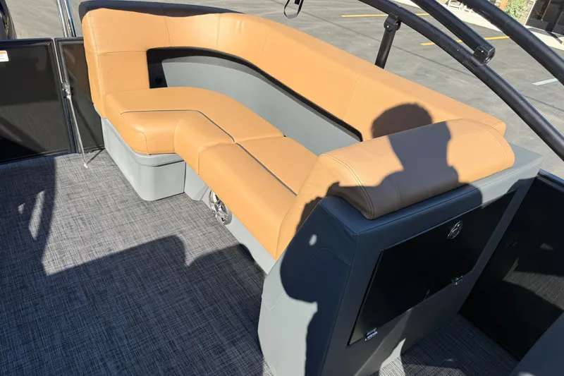 Slide: The Image of Luxurious seating on 2027 Whisper Drift RLS boat with tan and gray upholstery. - 15
