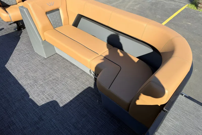 Slide: The Image of Luxurious tan seating on Whisper Drift RLS 2027 boat, featuring modern design and comfort. - 11