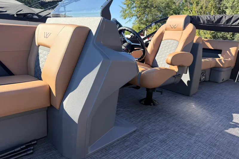 Slide: The Image of Luxurious interior of 2027 Whisper Drift RLS boat with tan leather seating and modern design. - 7