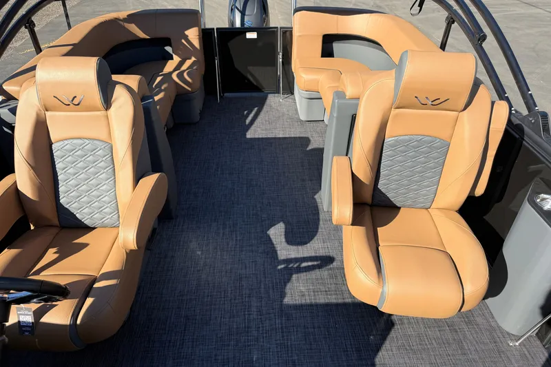 Slide: The Image of Luxurious interior of 2027 Whisper Drift RLS boat with tan leather seating. - 8