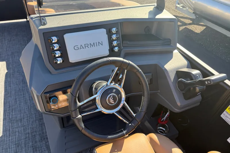 Slide: The Image of Steering console of 2027 Whisper Drift RLS boat with Garmin navigation system. - 9