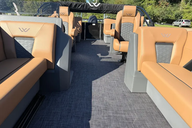 Slide: The Image of Luxurious interior of 2027 Whisper Drift RLS boat with tan leather seating. - 5