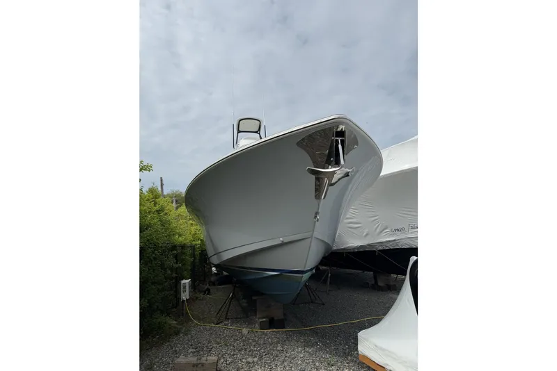 Slide: The Image of 2022 Valhalla Boatworks V-41 on dry dock, showcasing sleek hull design. - 11