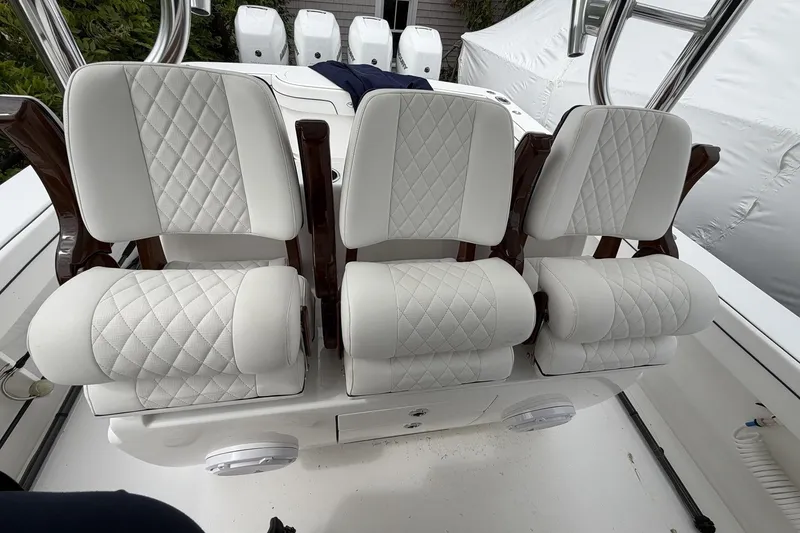 Slide: The Image of Luxurious seating on 2022 Valhalla Boatworks V-41, featuring quilted white upholstery and sleek design. - 32