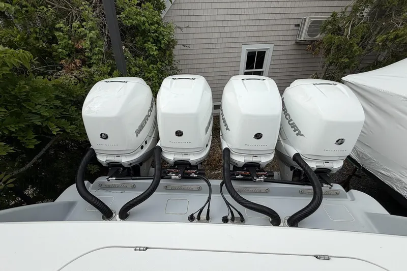 Slide: The Image of Four Mercury outboard engines on a 2022 Valhalla Boatworks V-41. - 33