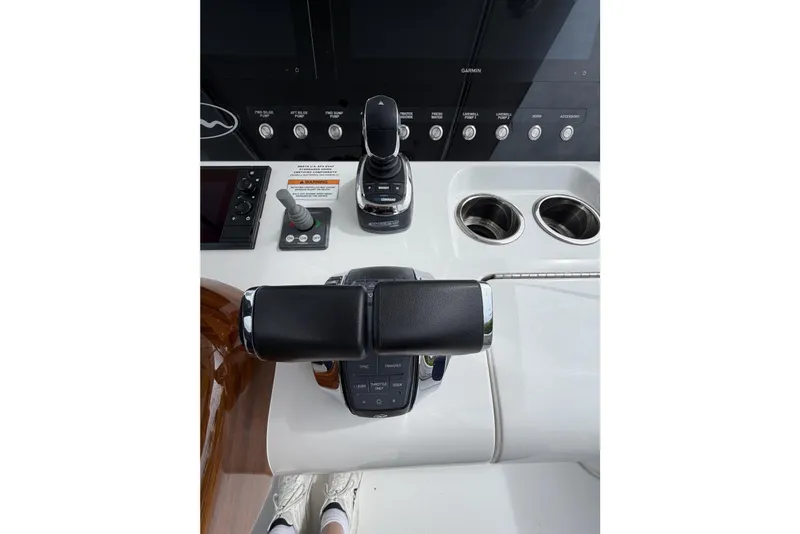 Slide: The Image of Control panel of 2022 Valhalla Boatworks V-41 with joystick and throttle controls. - 16