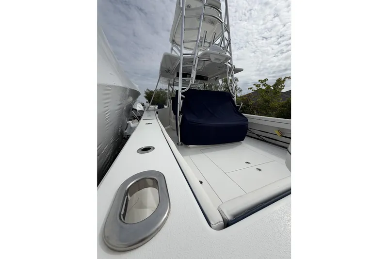 Slide: The Image of 2022 Valhalla Boatworks V-41 deck with seating and tower under cloudy sky. - 9