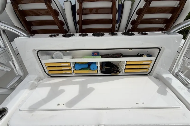 Slide: The Image of 2022 Valhalla Boatworks V-41 storage compartment with organized fishing gear and accessories. - 28