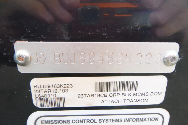 Slide: The Image of 2023 Tracker Targa V-19 Combo boat identification plate with serial numbers and labels. - 19