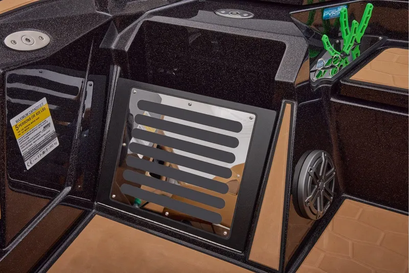 Slide: The Image of Manufacturer Provided Image: 2026 Ranger Z521R ULTRA boat interior with speaker and capacity label. - 53