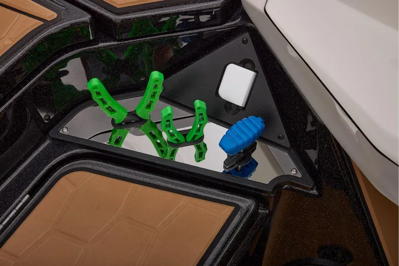 Slide: The Image of Manufacturer Provided Image: Interior view of 2026 Ranger Z521R ULTRA boat with green and blue accessories. - 39