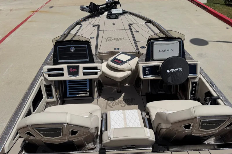 Slide: The Image of 2026 Ranger Z521R Ultra boat interior with Garmin electronics and premium seating. - 3