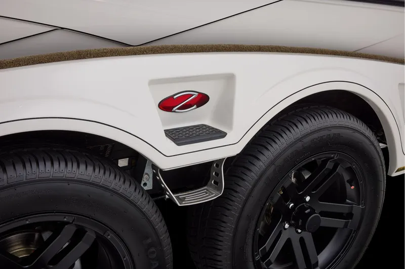 Slide: The Image of Manufacturer Provided Image: 2026 Ranger Z521R ULTRA trailer with black wheels and step detail. - 71