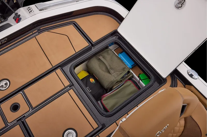 Slide: The Image of Manufacturer Provided Image: Storage compartment of 2026 Ranger Z521R ULTRA boat with organized gear and accessories. - 62