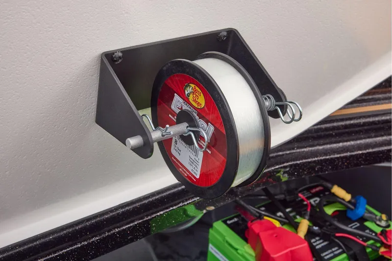 Slide: The Image of Manufacturer Provided Image: Fishing line spool holder on 2026 Ranger Z521R ULTRA boat, with visible battery connections. - 65
