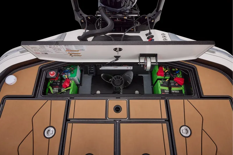 Slide: The Image of Manufacturer Provided Image: 2026 Ranger Z521R ULTRA boat battery compartment with organized storage and wiring. - 63
