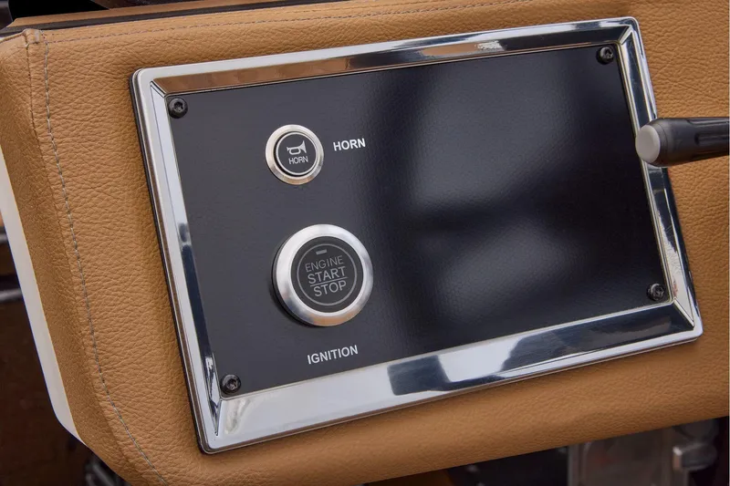 Slide: The Image of Manufacturer Provided Image: Dashboard of 2026 Ranger Z521R ULTRA with horn and ignition buttons. - 44