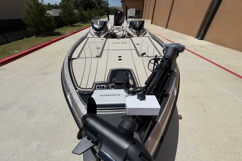 Slide: The Image of 2026 Ranger Z521R Ultra boat with Garmin equipment on a concrete surface. - 4
