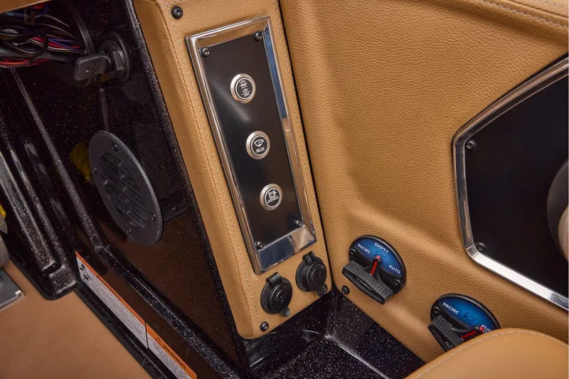 Slide: The Image of Manufacturer Provided Image: Control panel of 2026 Ranger Z521R ULTRA boat with switches and dials. - 46