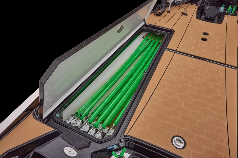 Slide: The Image of Manufacturer Provided Image: 2026 Ranger Z521R ULTRA boat with open storage compartment and green rods. - 29