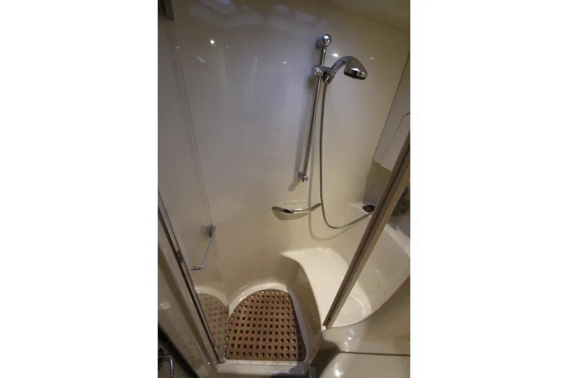 Slide: The Image of Shower area in 2001 Sea Ray 380 Sundancer yacht with handheld showerhead. - 43