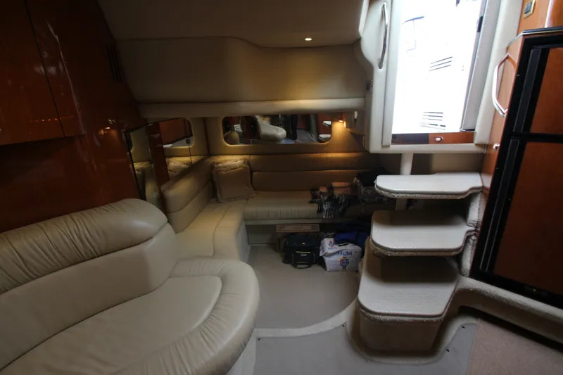 Slide: The Image of Luxurious interior of 2001 Sea Ray 380 Sundancer yacht with plush seating and elegant design. - 45