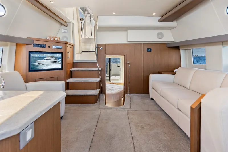 Slide: The Image of Luxurious interior of 2012 Carver 41 Cockpit Motor Yacht with modern furnishings. - 24