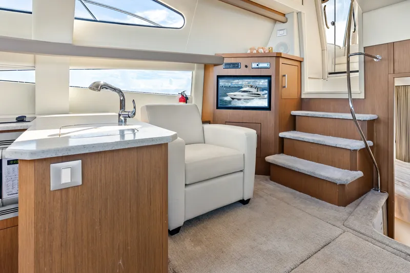 Slide: The Image of Luxurious interior of 2012 Carver 41 Cockpit Motor Yacht with modern amenities. - 32