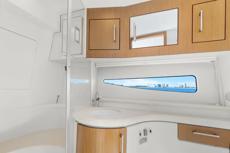 Slide: The Image of Luxurious bathroom interior of 2012 Carver 41 Cockpit Motor Yacht with ocean view. - 39