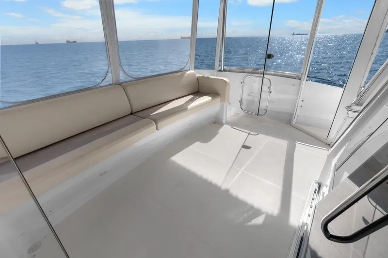 Slide: The Image of Spacious cockpit of 2012 Carver 41 Cockpit Motor Yacht with ocean view. - 20