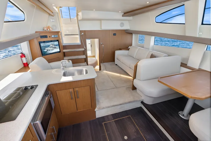Slide: The Image of Luxurious interior of 2012 Carver 41 Cockpit Motor Yacht with modern amenities. - 23