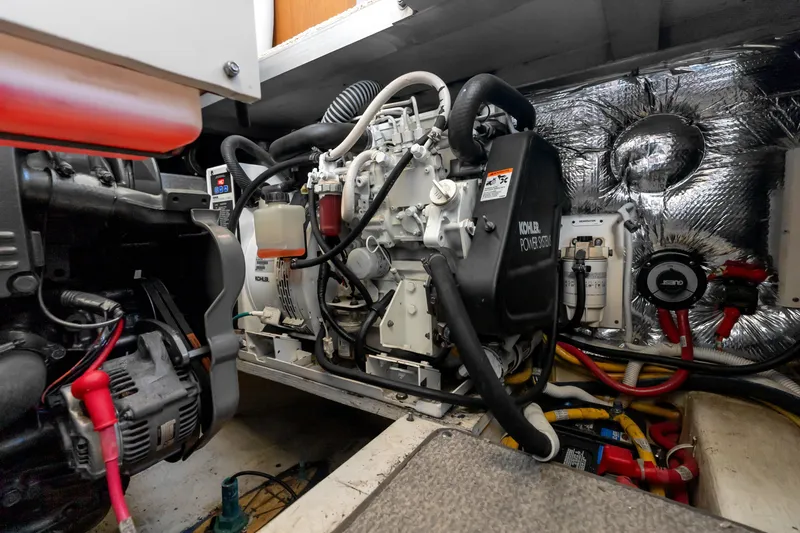 Slide: The Image of Engine room of 2012 Carver 41 Cockpit Motor Yacht with Kohler power system. - 50