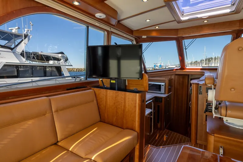 Slide: The Image of Luxurious interior of 2021 Sabre 45 Salon Express yacht with leather seating and modern amenities. - 13
