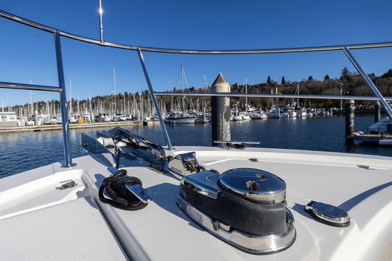 Slide: The Image of Bow view of 2021 Sabre 45 Salon Express yacht at marina. - 9