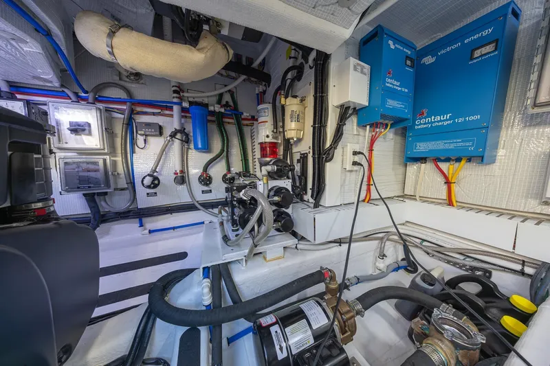 Slide: The Image of Engine room of 2021 Sabre 45 Salon Express with advanced electrical systems and components. - 40