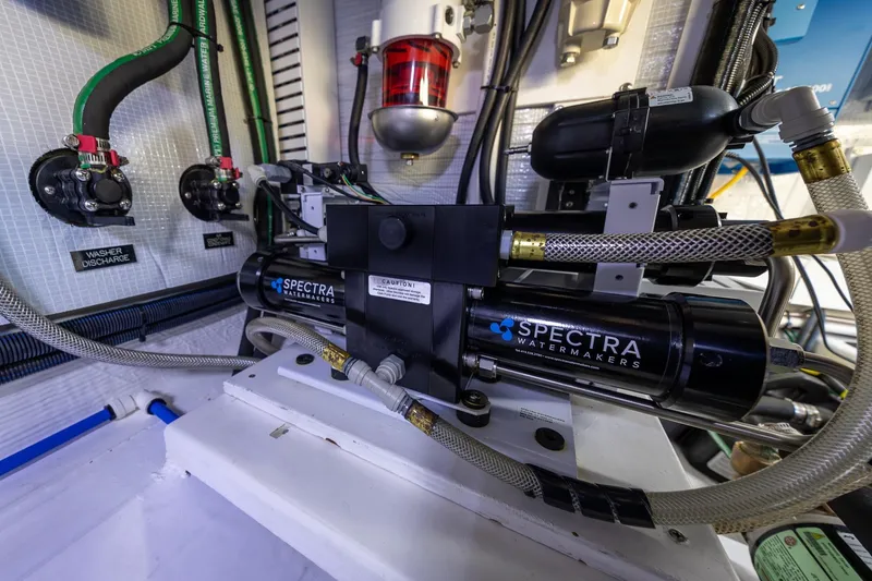 Slide: The Image of Engine room of 2021 Sabre 45 Salon Express featuring Spectra watermaker system. - 46