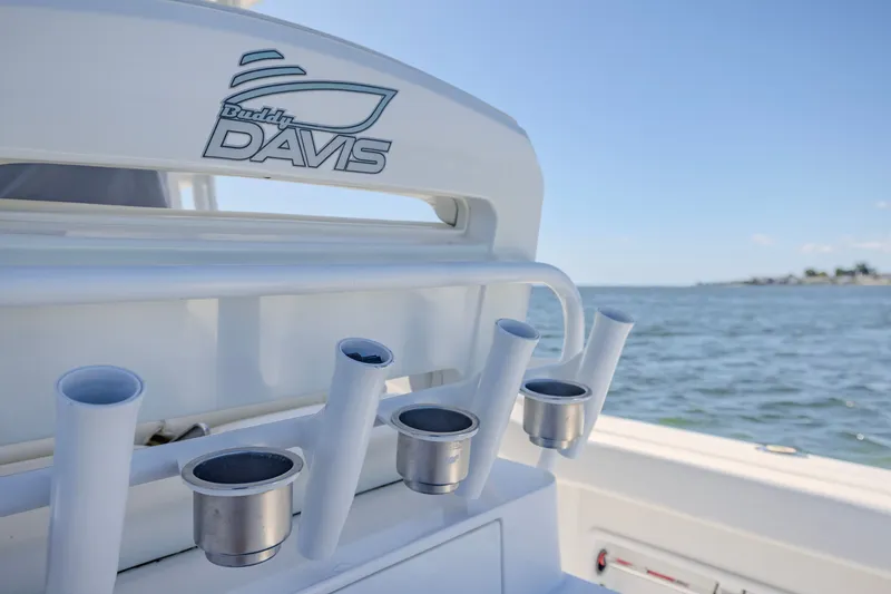 Slide: The Image of 2016 Buddy Davis 28 Center Console boat with rod holders, ocean view. - 11