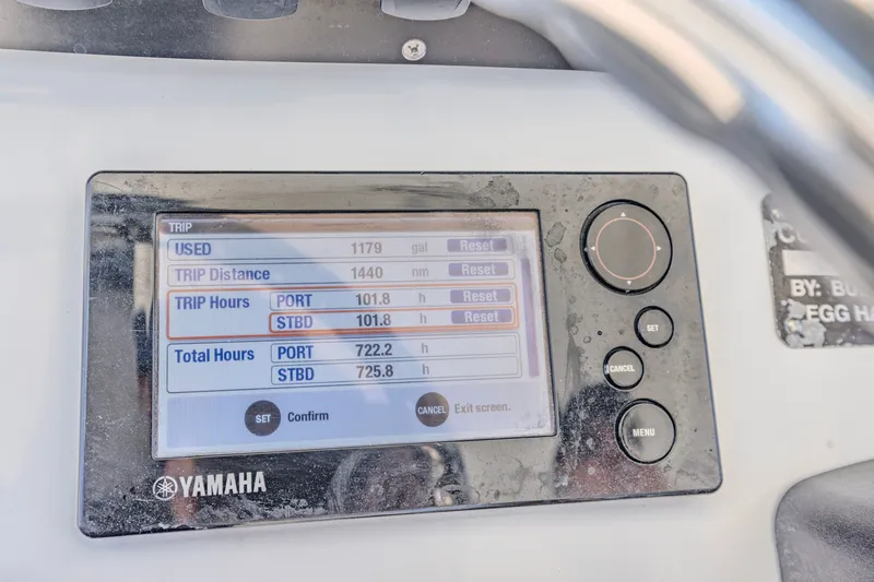 Slide: The Image of Yamaha display on 2016 Buddy Davis 28 Center Console showing trip data and engine hours. - 8
