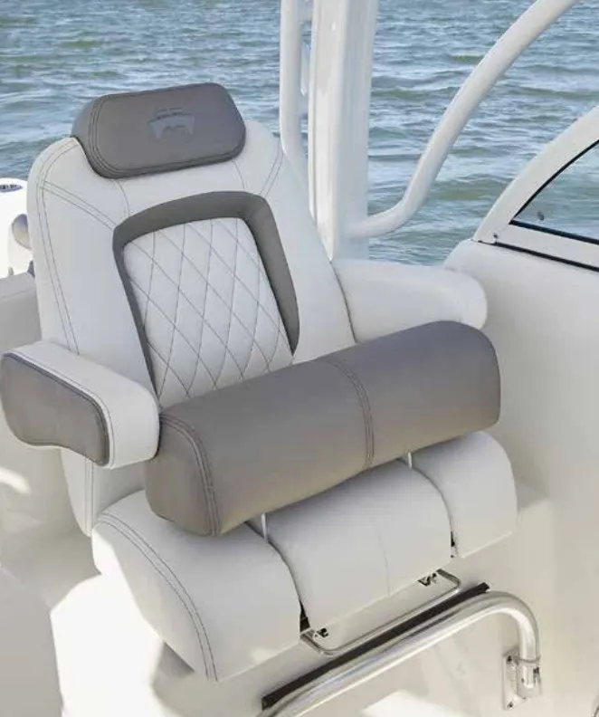 Slide: The Image of A luxurious, padded boat seat with gray and white accents on a World Cat 255 DC. - 16