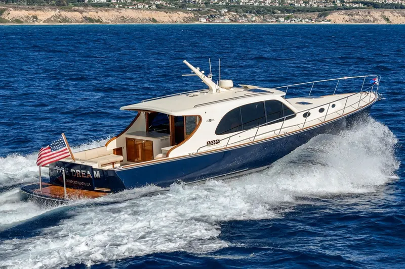 Slide: The Image of 2019 Palm Beach Motor Yachts Express cruising on blue ocean waters. - 34