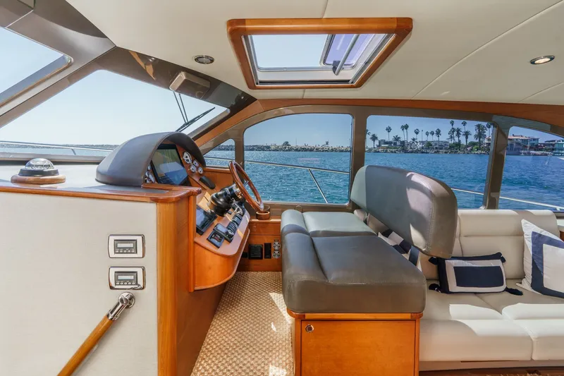 Slide: The Image of Luxurious 2019 Palm Beach Motor Yachts Express interior with elegant helm and seating. - 20