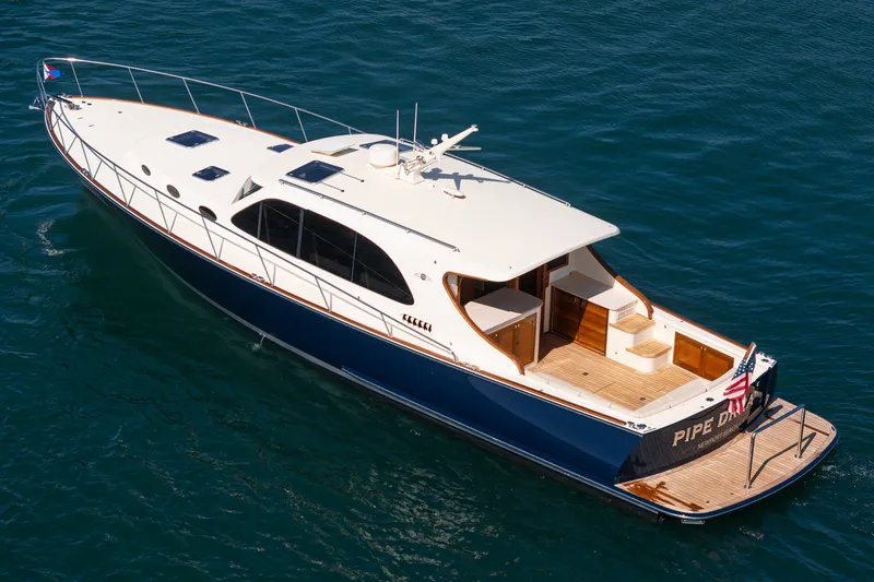 Slide: The Image of 2019 Palm Beach Motor Yachts Express cruising on open water, elegant design and sleek lines. - 38