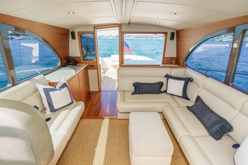 Slide: The Image of Luxurious interior of 2019 Palm Beach Motor Yachts Express with elegant seating and ocean view. - 14