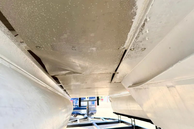 Slide: The Image of Underneath view of a 2000 Harris-Kayot Classic 220 O/B pontoon boat. - 75